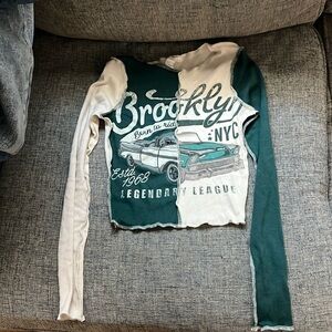 very cute cream and green long sleeve shirt